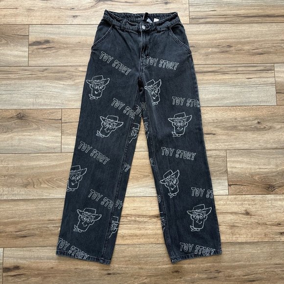 H&M Divided Toy Story Print Denim Jeans SZ 2 Black Baggy Pattern Disney Pixar - Picture 1 of 11